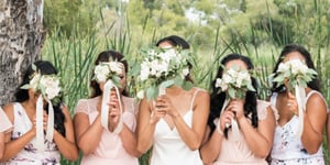 Bride and bridesmaids with bouquets