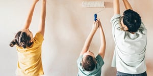 family painting walls