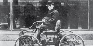 Henry Ford on a motorcar