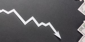 Jagged arrow going down with cash