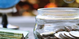 clear jar with cash
