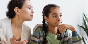 mom teen looking at computer