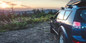 parked watching a mountain sunset